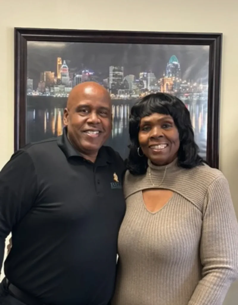 Dr. Henry Bell with a patient at Bell Chiropractic & Wellness Center
