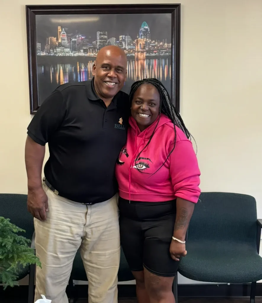 Dr. Henry Bell with a patient at Bell Chiropractic & Wellness Center